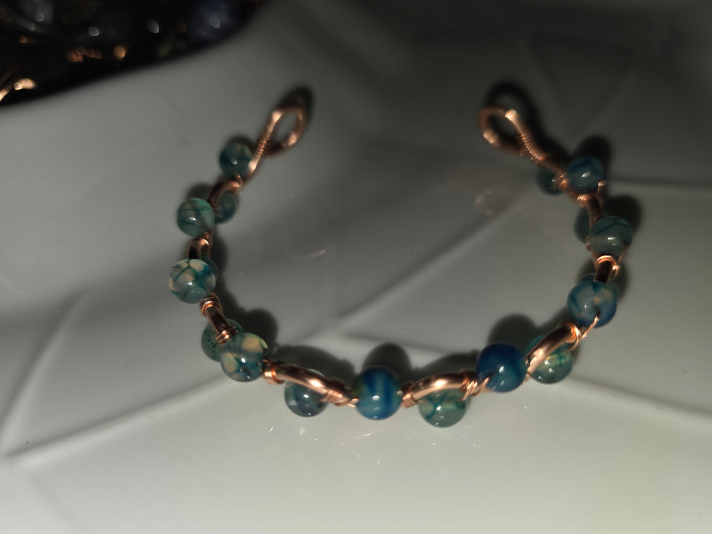 Dragon glass and copper hand wrapped wire bracelet