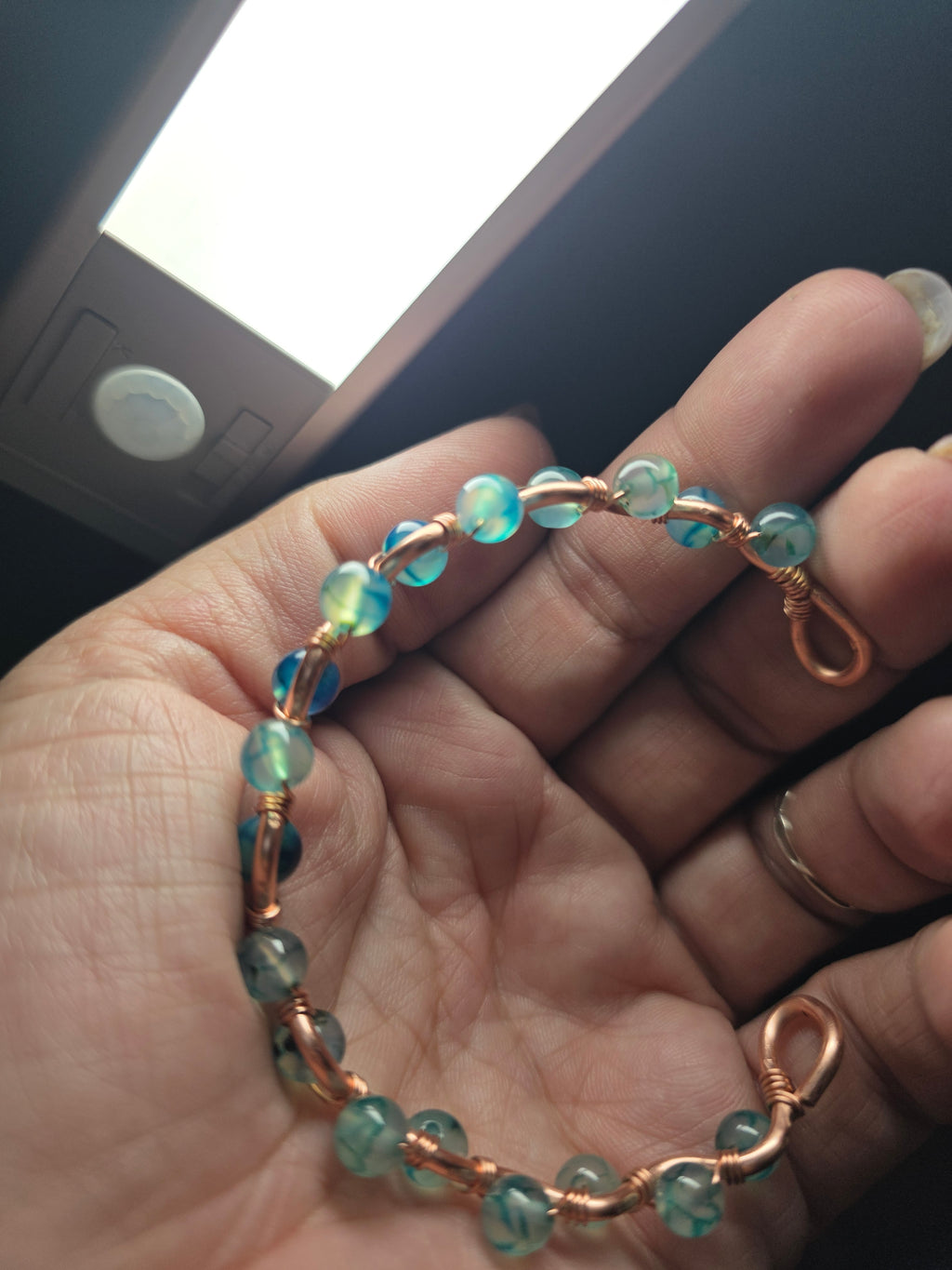 Dragon glass and copper hand wrapped wire bracelet