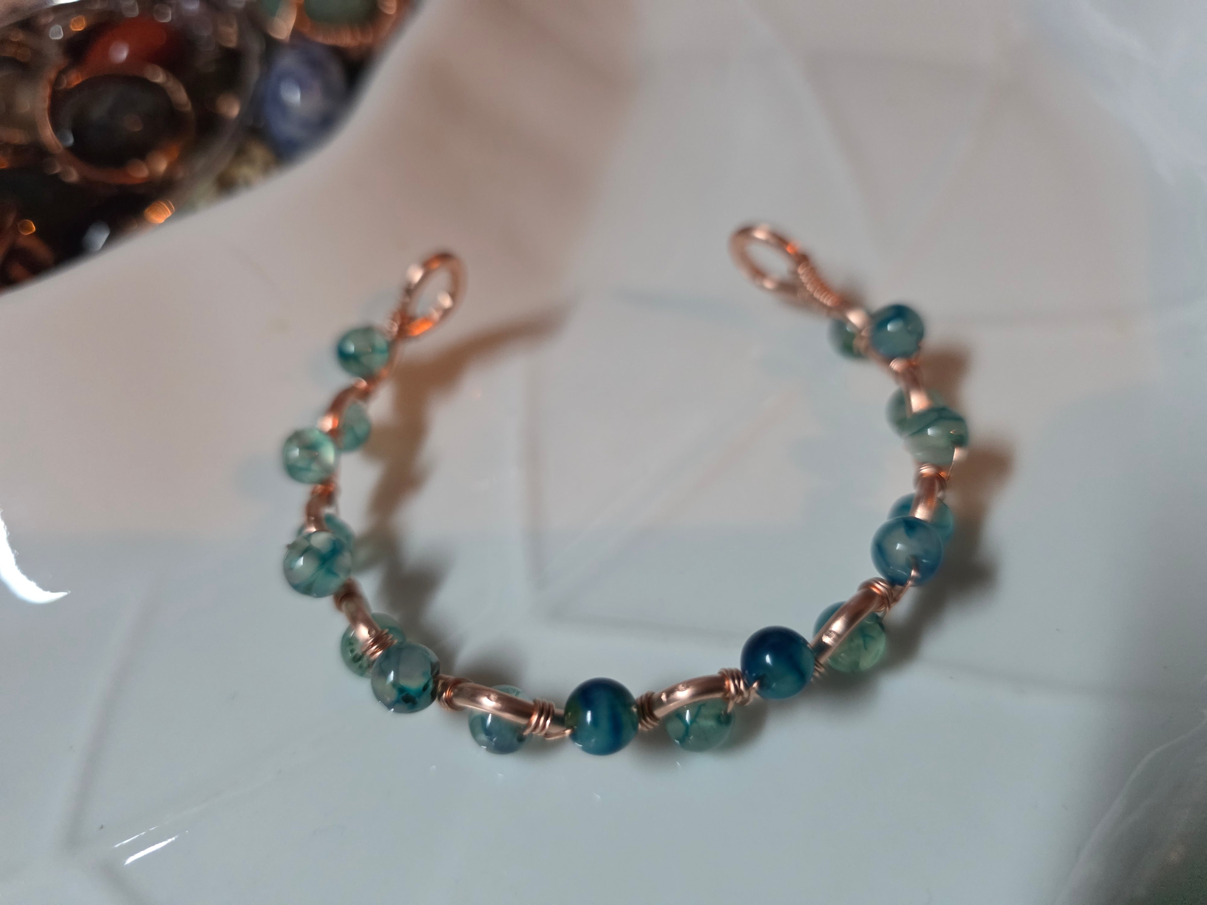 Dragon glass and copper hand wrapped wire bracelet
